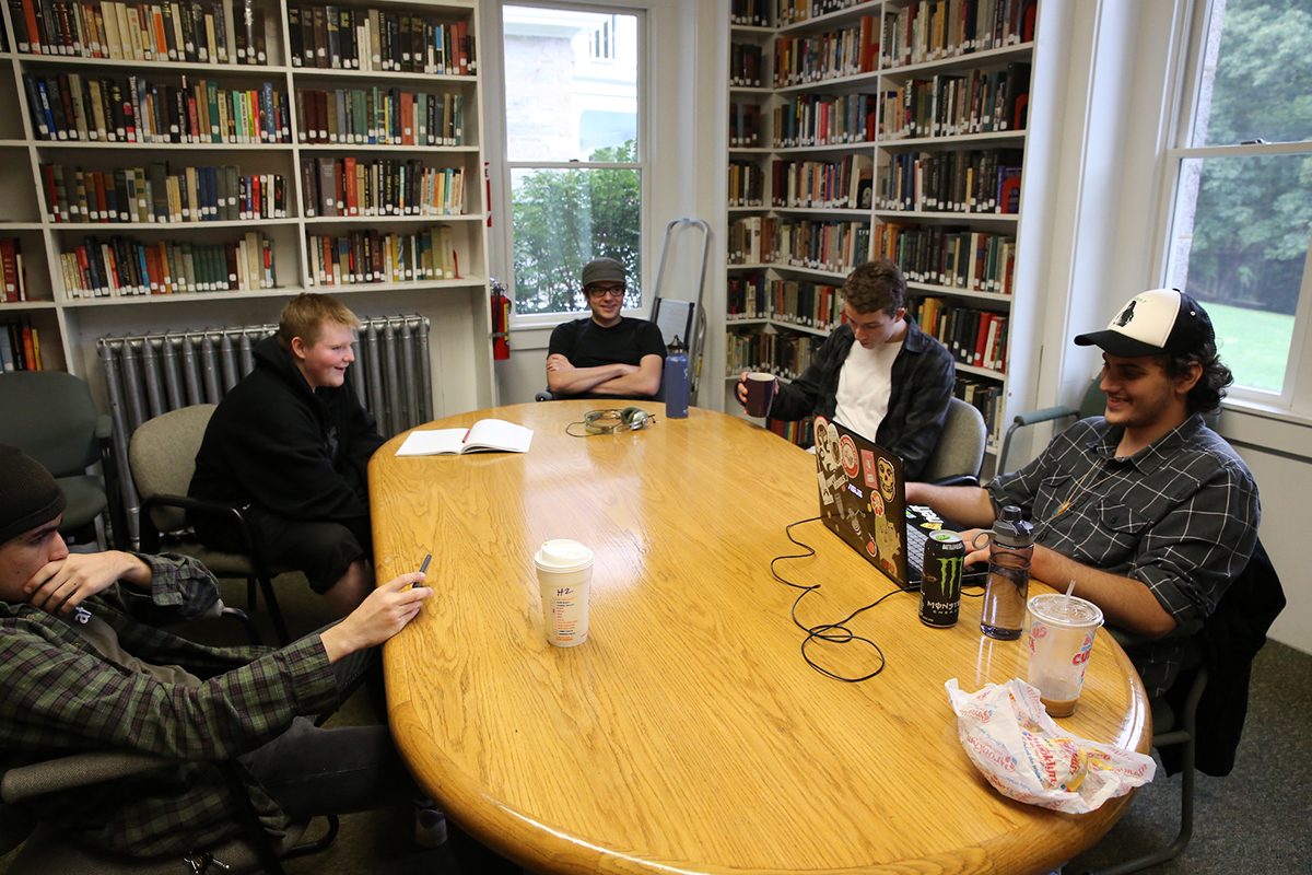 students sitting around conference table