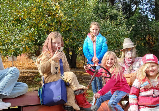 students on a tractor